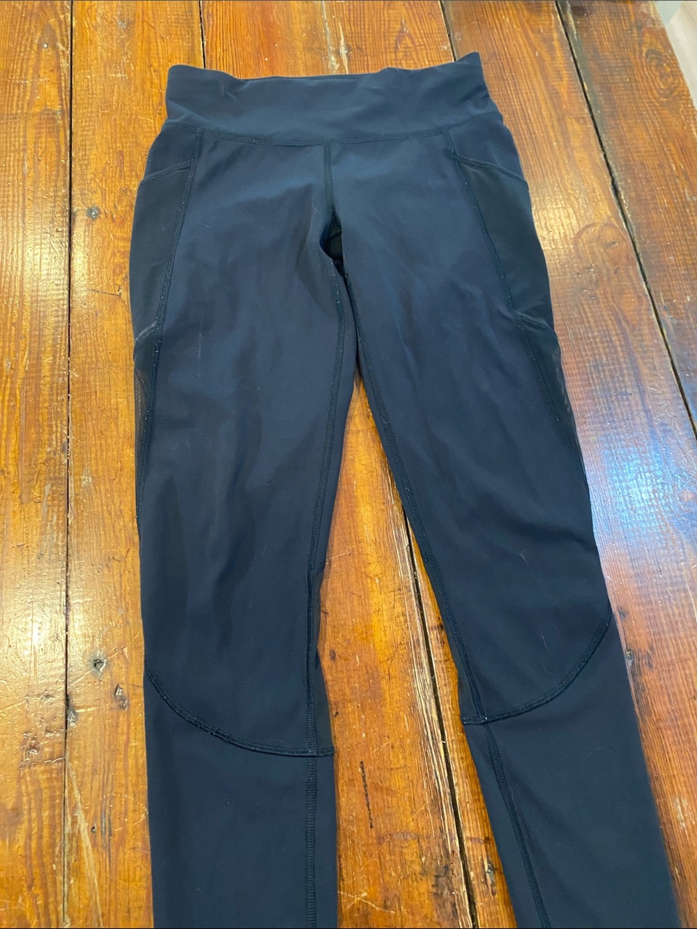 Lululemon black women’s leggings with sheer side panels